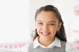 Hispanic girl with orthodontic braces - Parkway Orthodontics in Sioux Falls, SD